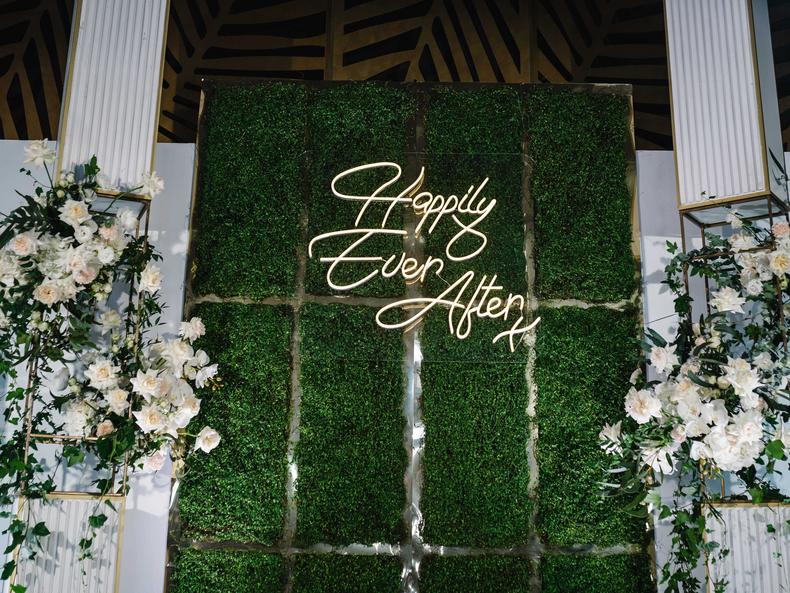 Boxwood walls have been a staple in the wedding industry since about 2015. Although the greenery was great as photo-booth backdrops or a place to put neon signs, I think it's been a bit overused at this point.