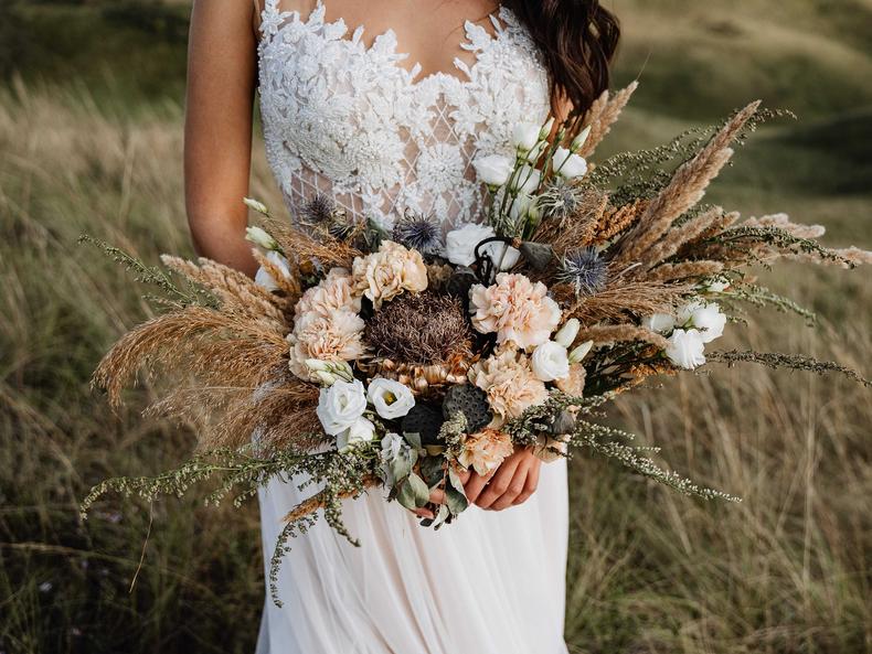 The boho aesthetic has been super popular in the past few years and it blends together natural, rustic, and vintage touches. I think it's time to say goodbye to boho-style weddings for now and I don't think we'll be seeing its crochet decor, pampas grass, and muted colors as we head into 2023.